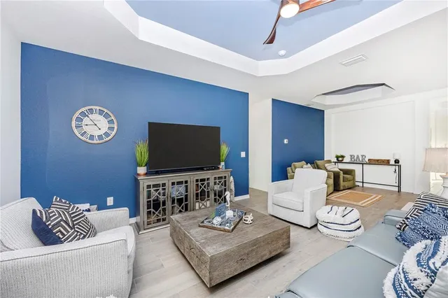 a bathroom with a sink a large mirror and a bathtub