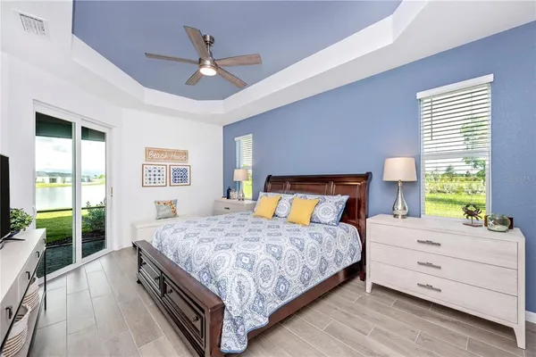 a bathroom with a sink vanity mirror and toilet