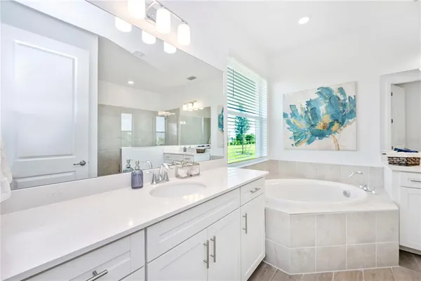 a view of a house with backyard and porch