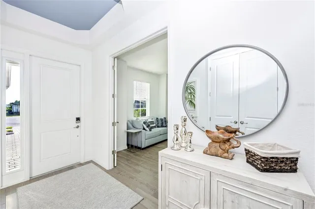 a kitchen with stainless steel appliances a stove a sink a refrigerator and cabinets