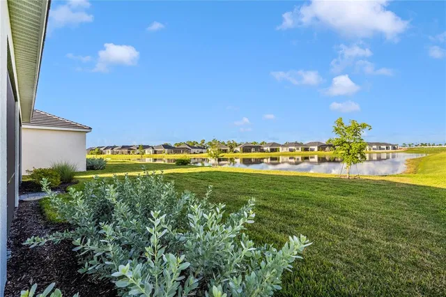 a view of a lake with a outdoor space