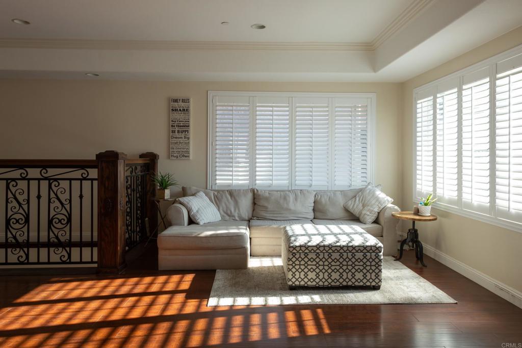 1657 Coronado Avenue Spring Valley, CA 91977 - Photo 7 of 46 a living room with furniture window and wooden floor