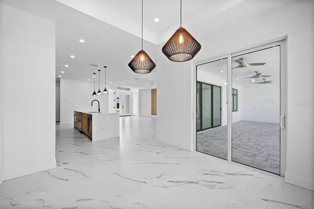 a bedroom with a bed and a table