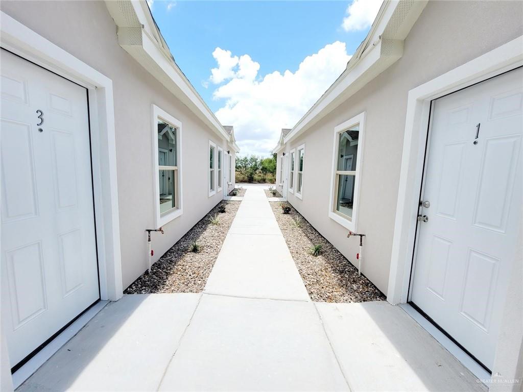 2808 Rosemary Drive, Unit 1 Weslaco, TX 78599 - Photo 2 of 13 a view of a house with stairs