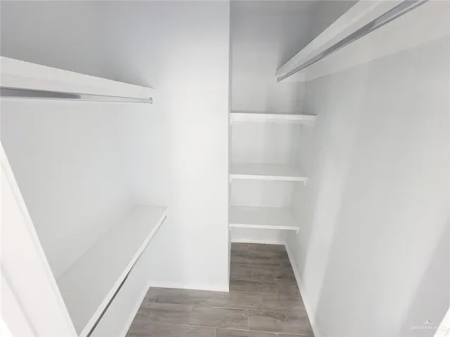 a view of an empty walk in closet