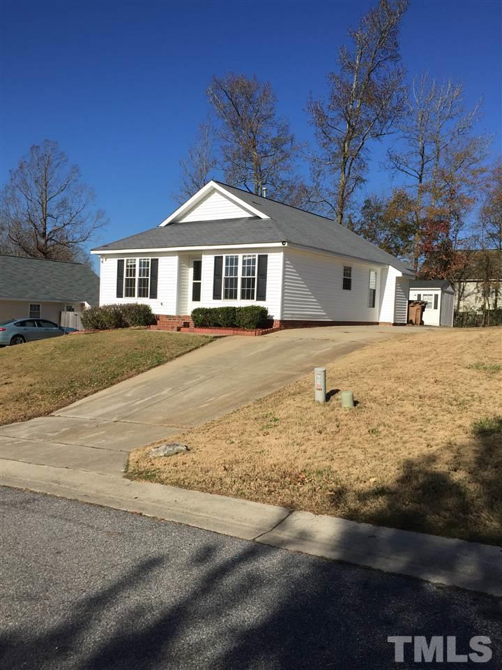 5405 Advantis Drive Raleigh, NC 27610 - Photo 1 of 16 a front view of a house with a yard