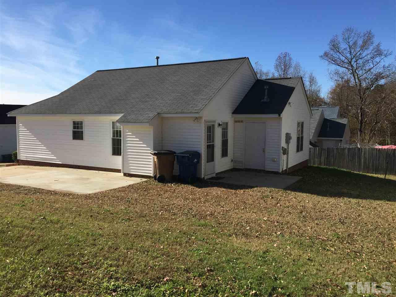 5405 Advantis Drive Raleigh, NC 27610 - Photo 2 of 16 a view of a house with a yard