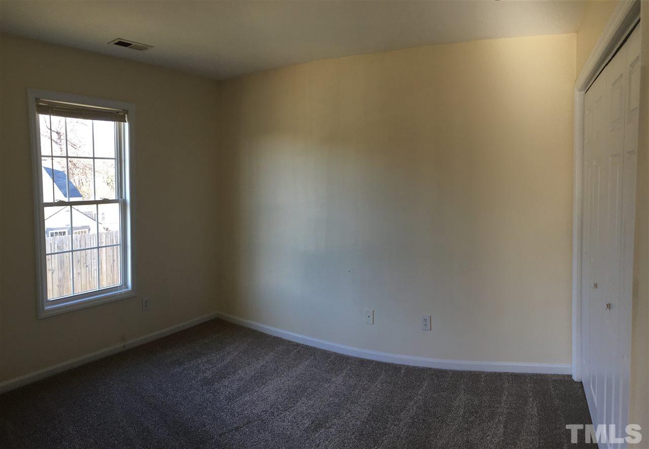 5405 Advantis Drive Raleigh, NC 27610 - Photo 11 of 16 an empty room with a window