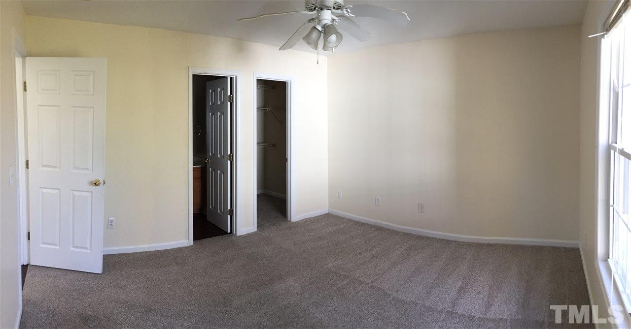 5405 Advantis Drive Raleigh, NC 27610 - Photo 8 of 16 an empty room with a window