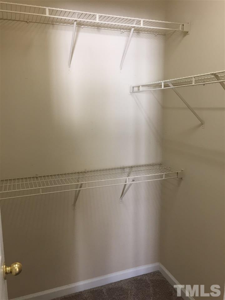5405 Advantis Drive Raleigh, NC 27610 - Photo 10 of 16 a view of a room with racks on the wall
