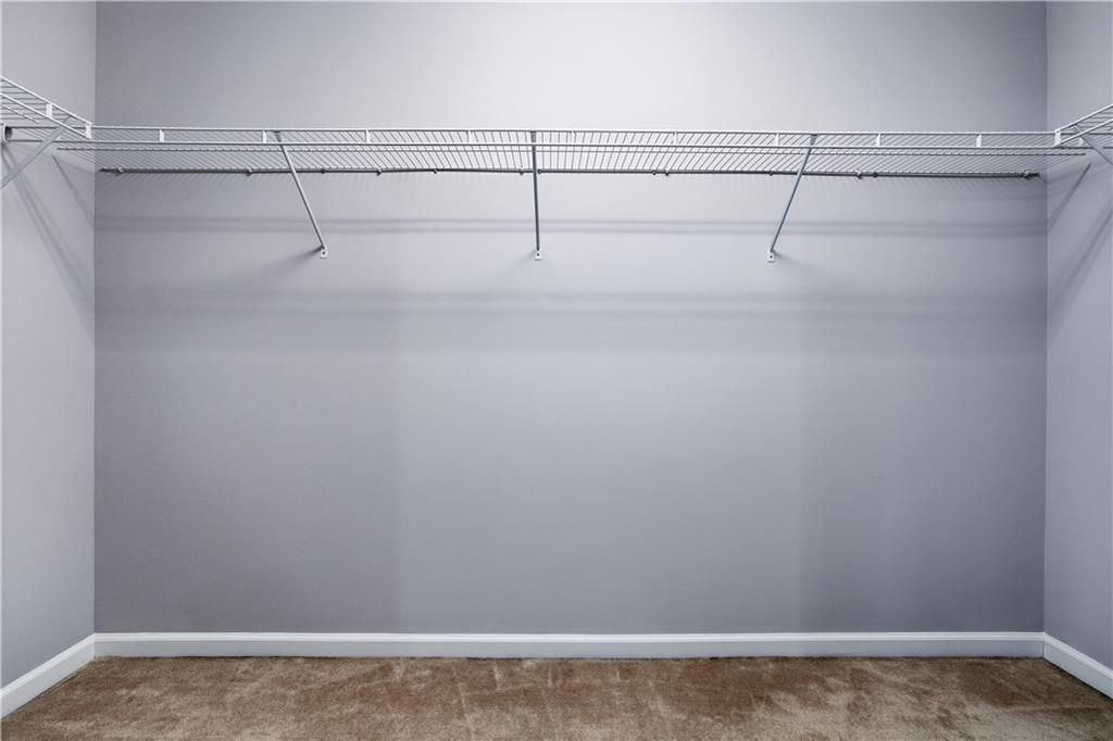 2310 Callaway Court Cumming, GA 30041 - Photo 19 of 30 a view of small space with racks on the wall