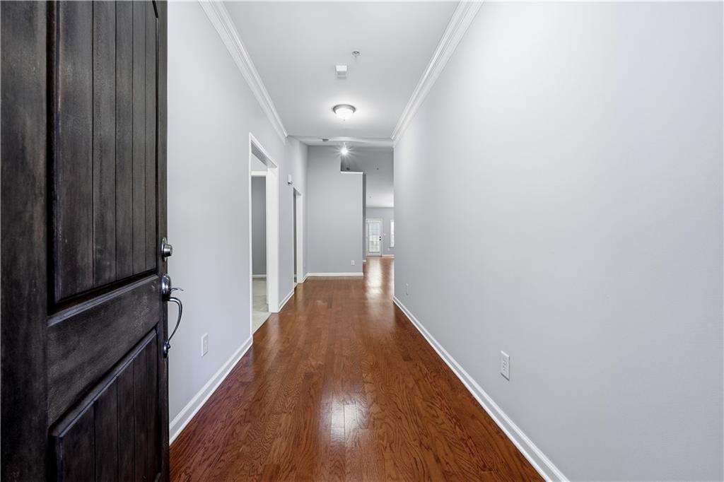 2310 Callaway Court Cumming, GA 30041 - Photo 2 of 30 a view of hallway with wooden floor