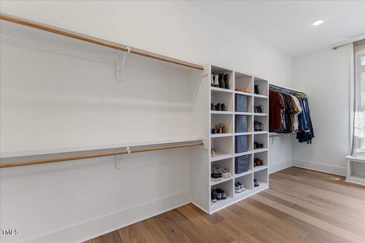 8420 Bells Lake Road Apex, NC 27539 - Photo 19 of 65 a view of an empty walk in closet
