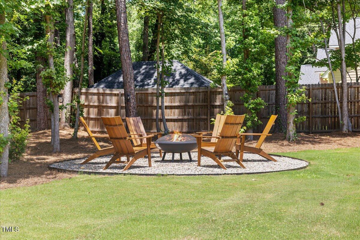 8420 Bells Lake Road Apex, NC 27539 - Photo 58 of 65 a view of a chairs and table in patio