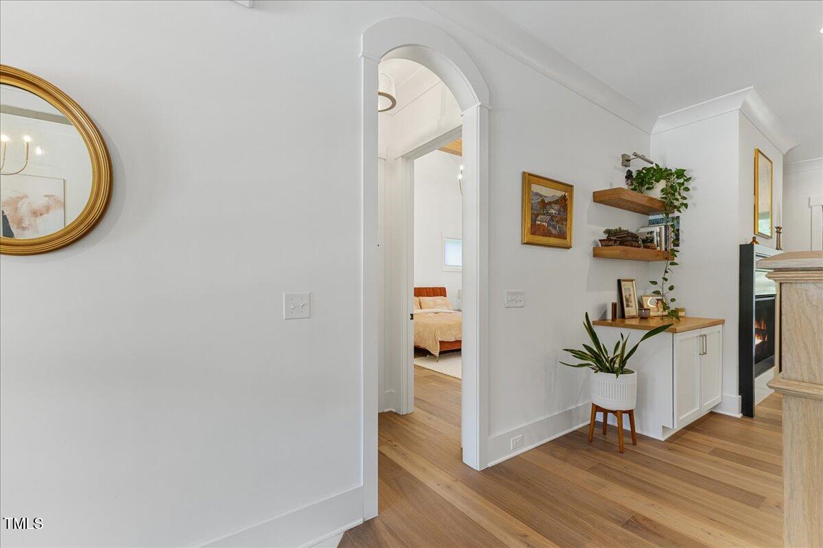 8420 Bells Lake Road Apex, NC 27539 - Photo 9 of 65 a view of a hallway with wooden floor and front door