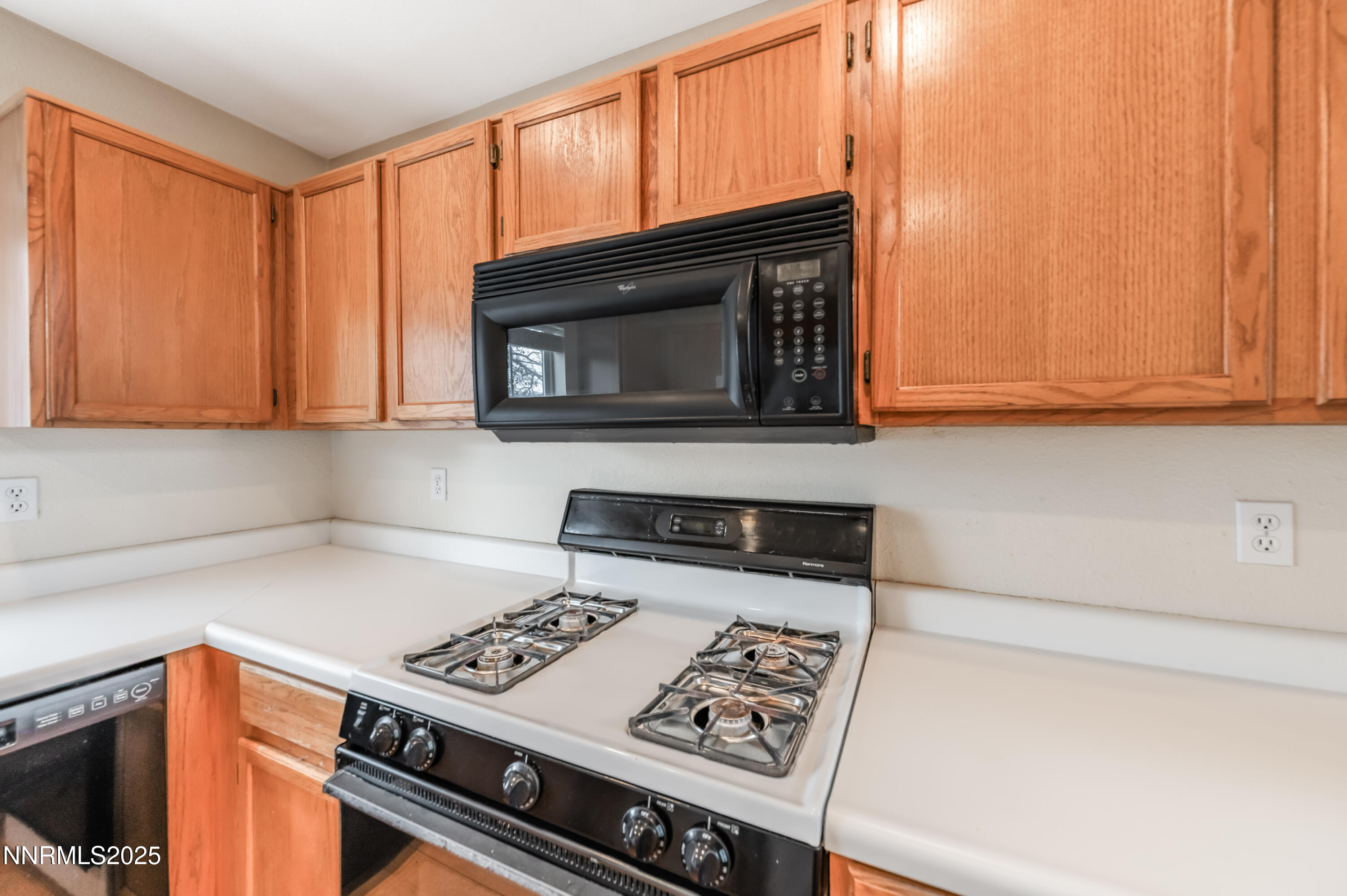 3188 Rose Vista Drive Reno, NV 89502 - Photo 14 of 30 a kitchen with a stove and a microwave