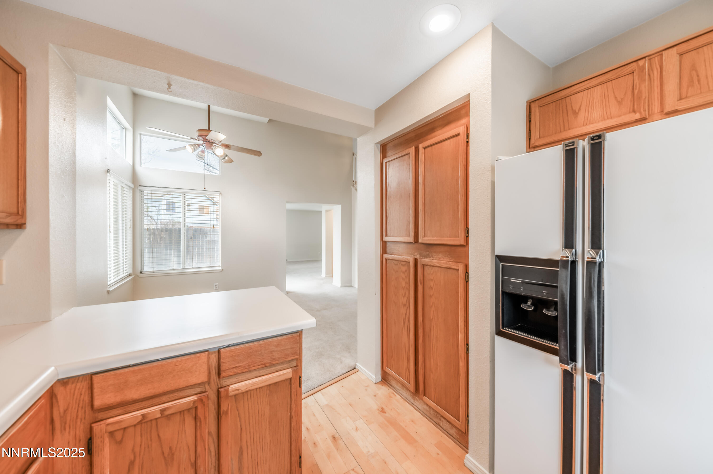 3188 Rose Vista Drive Reno, NV 89502 - Photo 16 of 30 a kitchen with stainless steel appliances granite countertop a refrigerator and a sink