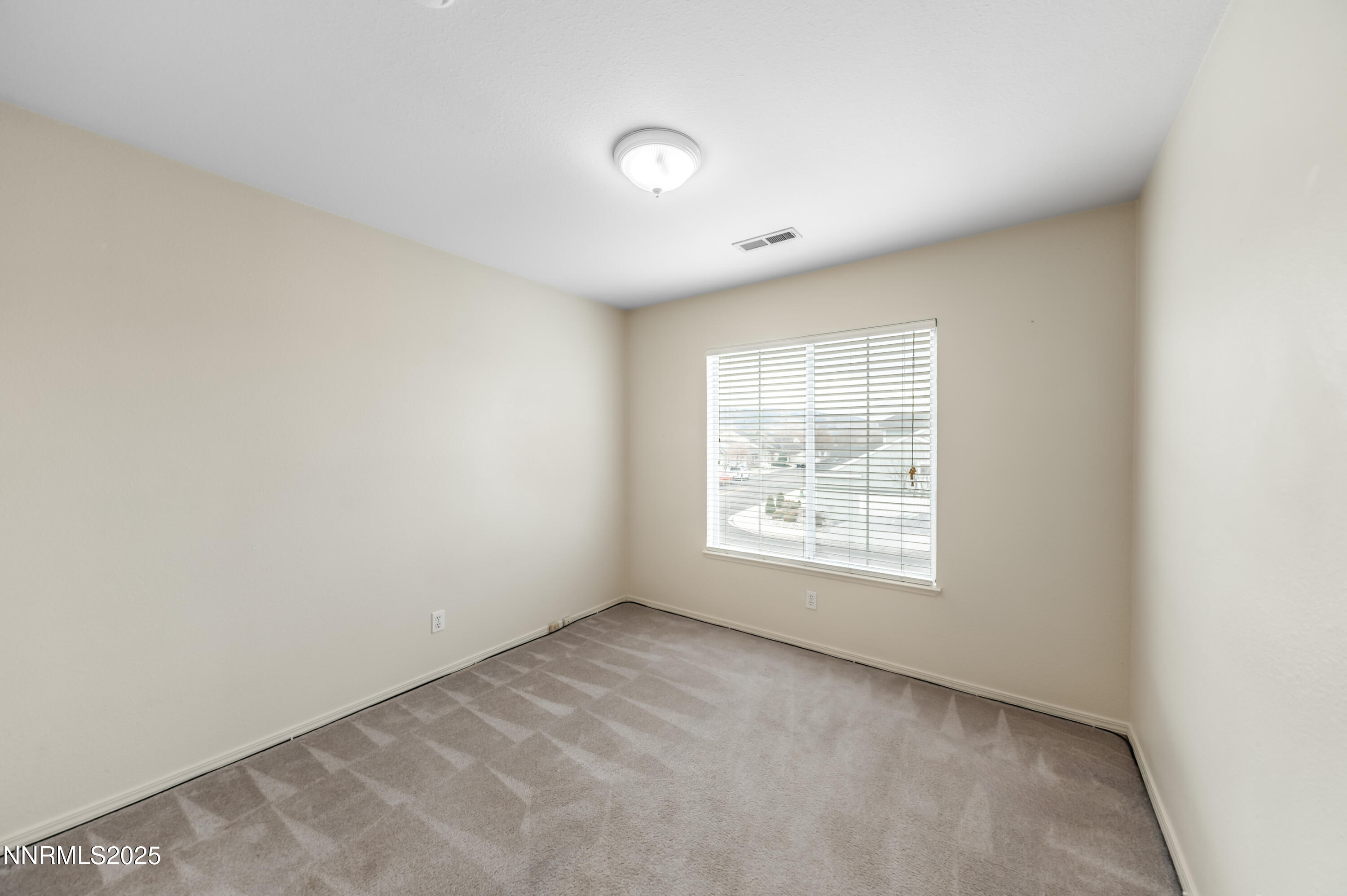3188 Rose Vista Drive Reno, NV 89502 - Photo 25 of 30 an empty room with a window
