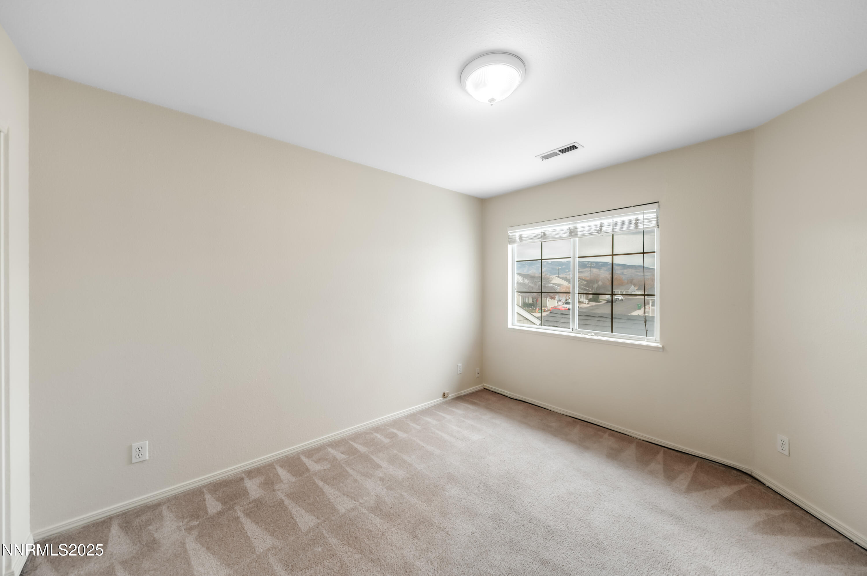 3188 Rose Vista Drive Reno, NV 89502 - Photo 26 of 30 an empty room with a window
