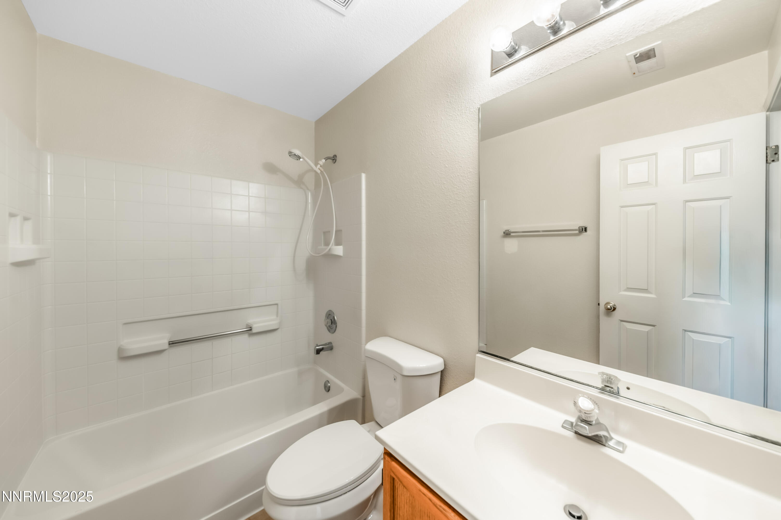 3188 Rose Vista Drive Reno, NV 89502 - Photo 27 of 30 a bathroom with a sink toilet and shower