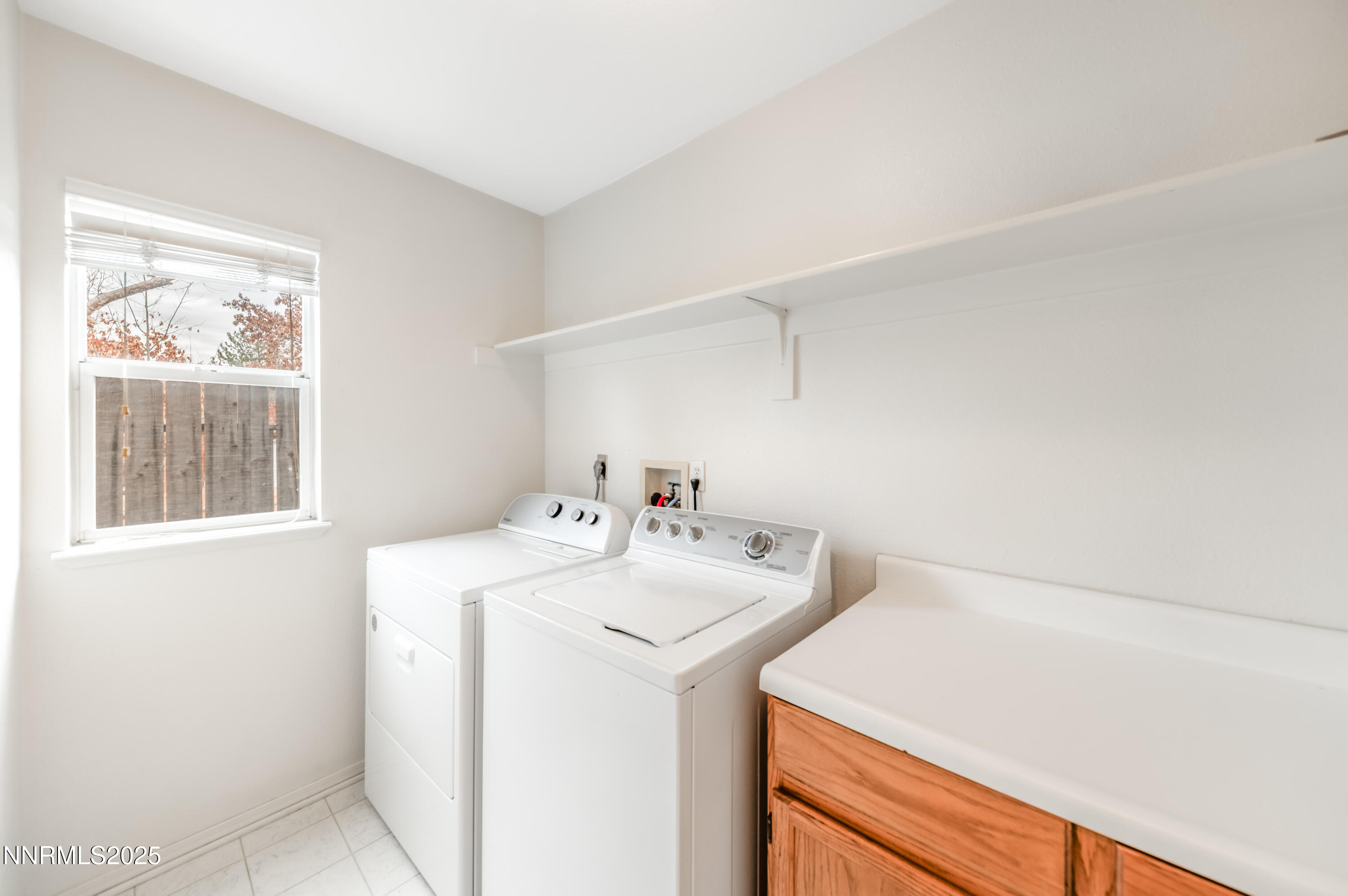 3188 Rose Vista Drive Reno, NV 89502 - Photo 29 of 30 a utility room with dryer and washer
