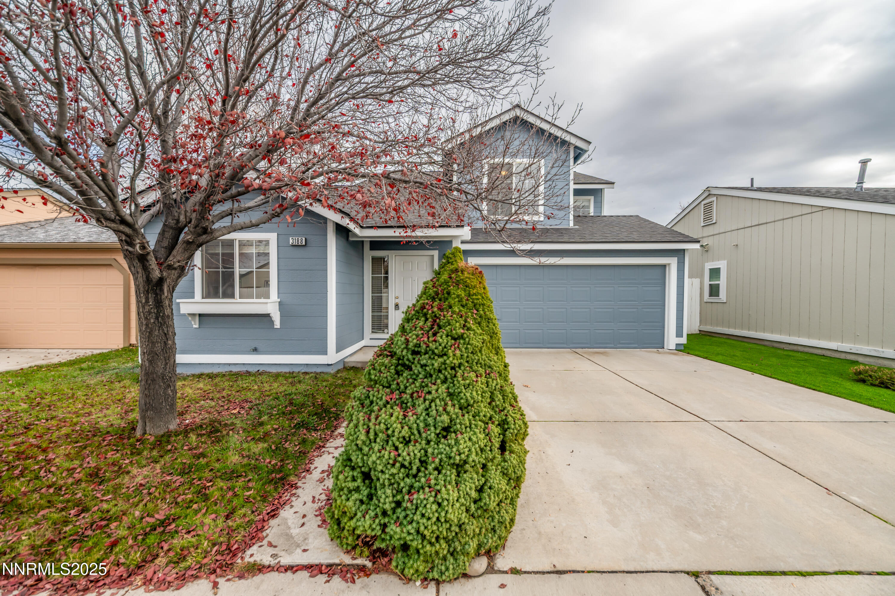 3188 Rose Vista Drive Reno, NV 89502 - Photo 3 of 30 front view of a house with a yard