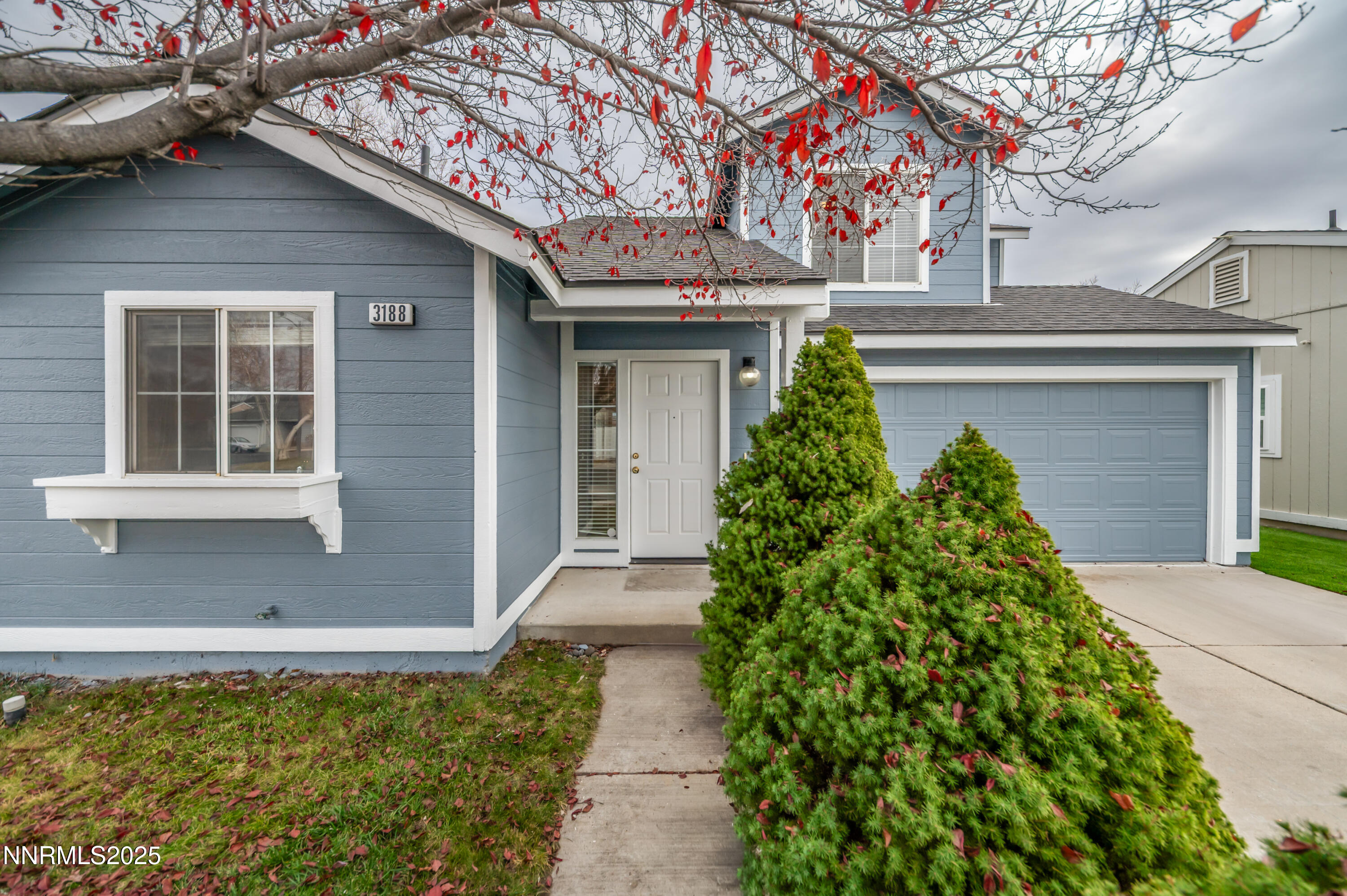 3188 Rose Vista Drive Reno, NV 89502 - Photo 5 of 30 a front view of a house with garden