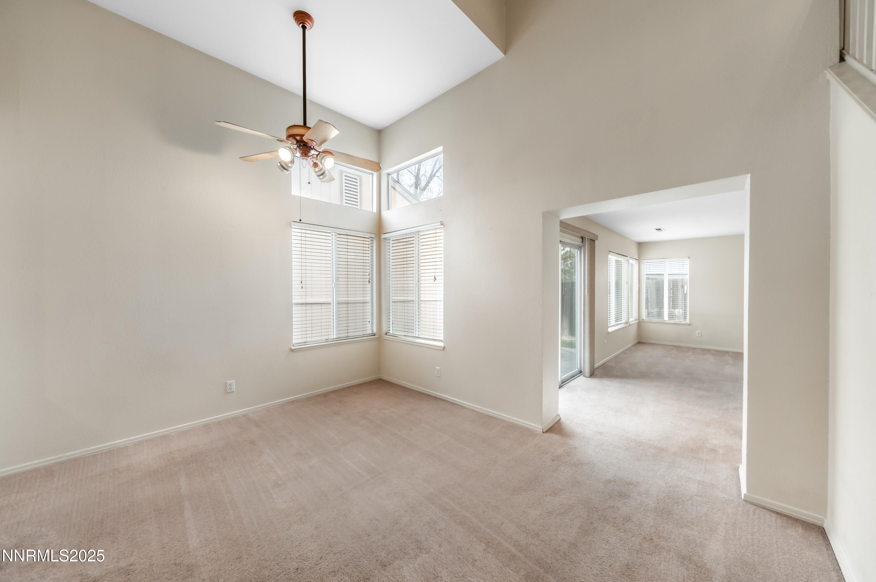 3188 Rose Vista Drive Reno, NV 89502 - Photo 8 of 30 a view of a big room with windows and chandelier
