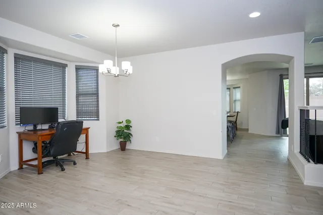 a view of a livingroom with a workspace