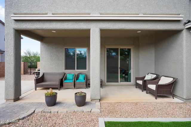 a front view of a house with patio