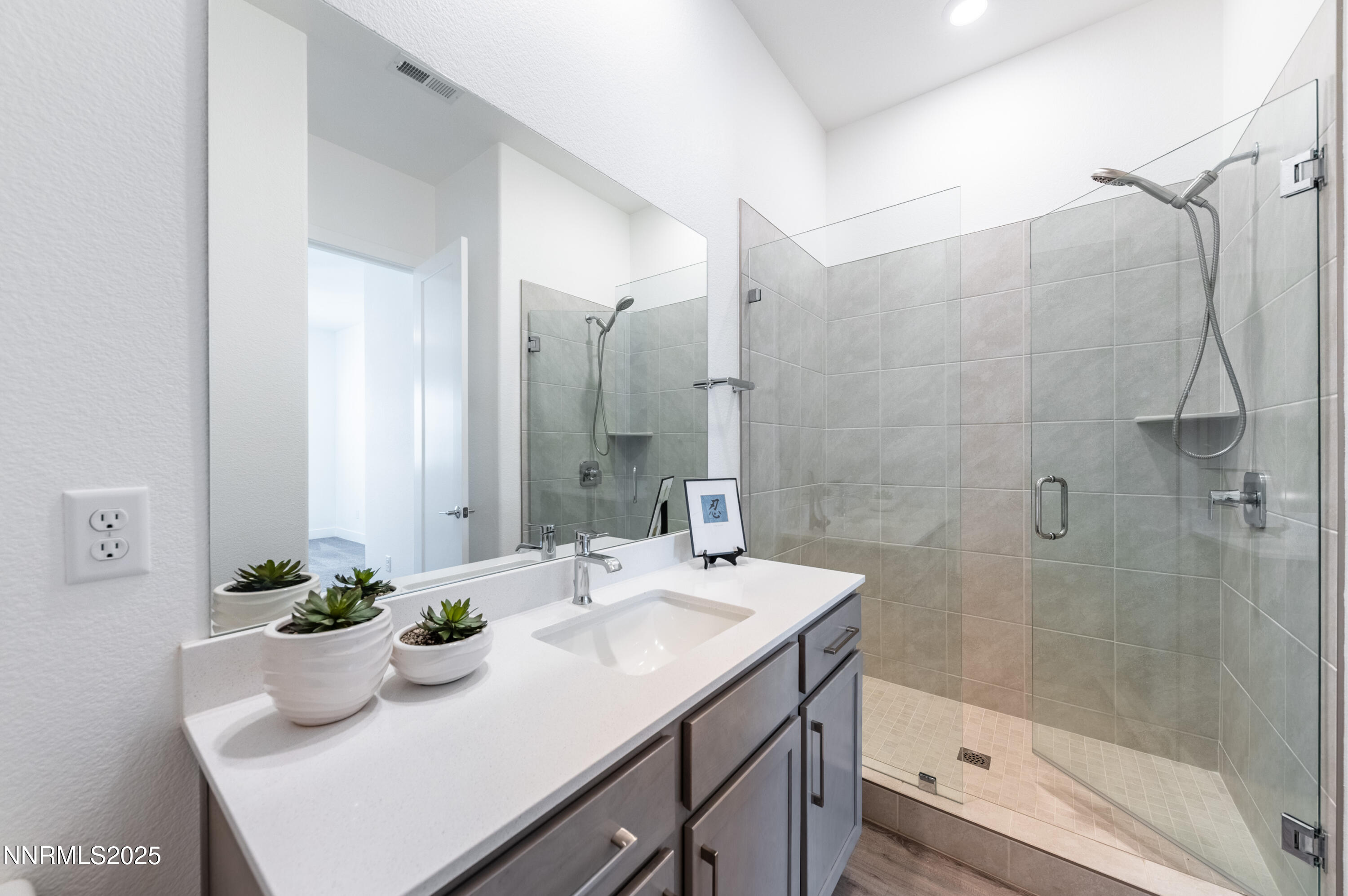 11640 Crosby Rnch Drive Sparks, NV 89441 - Photo 17 of 21 a bathroom with a sink and a mirror
