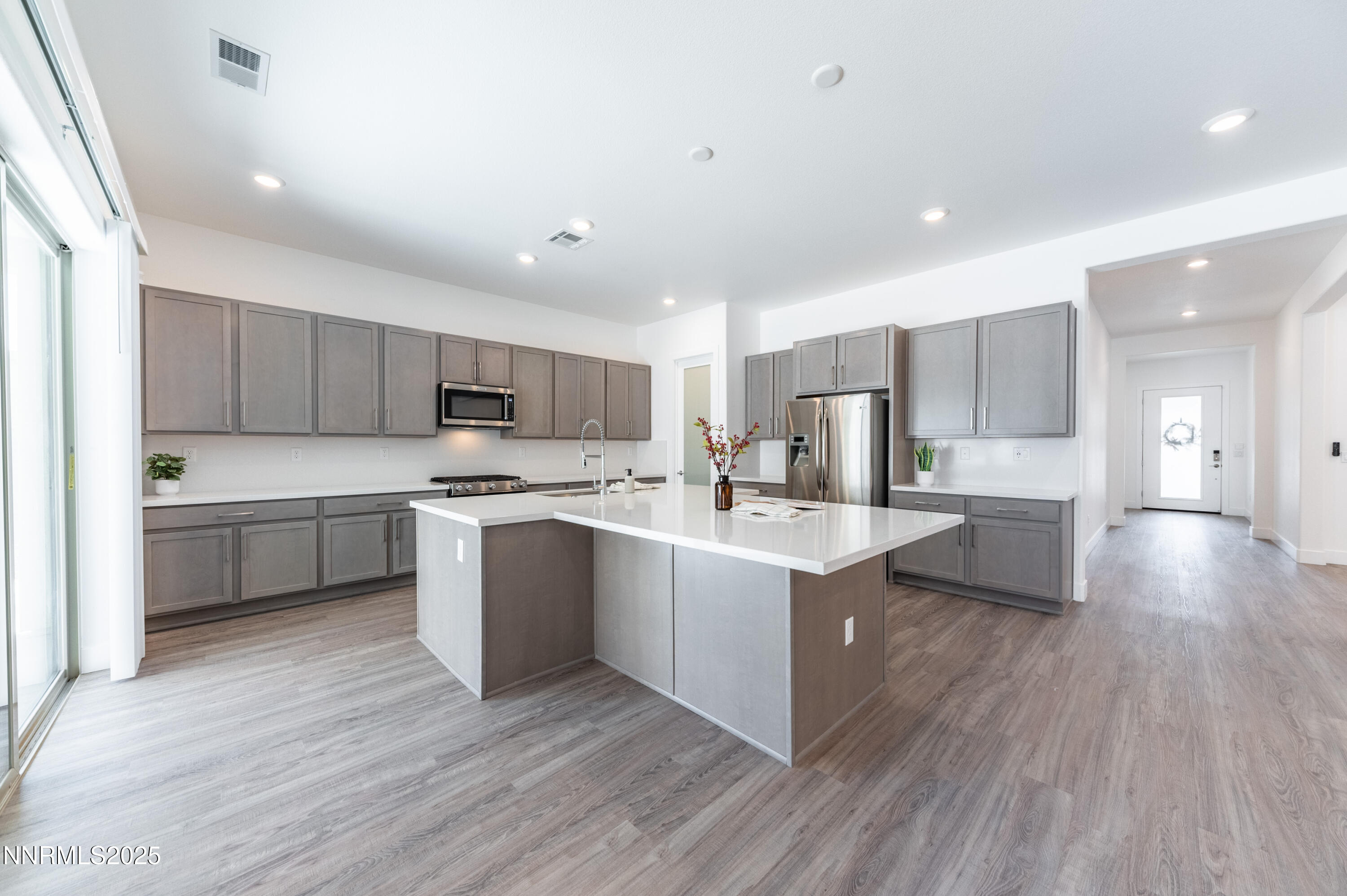 11640 Crosby Rnch Drive Sparks, NV 89441 - Photo 8 of 21 a kitchen with a sink cabinets and wooden floor