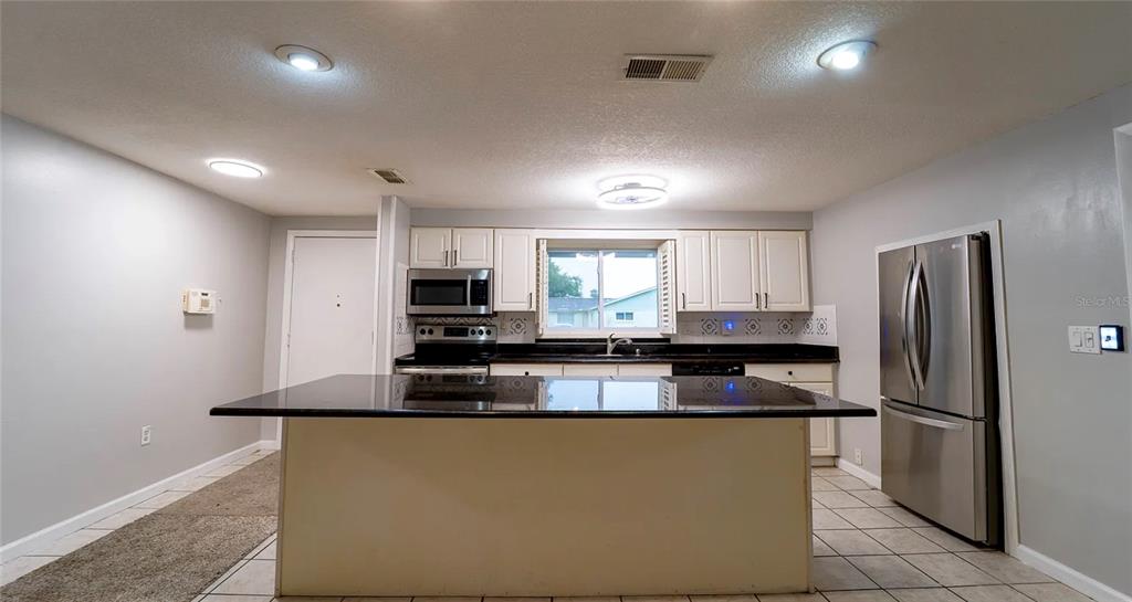 7713 Heather Street New Port Richey, FL 34653 - Photo 4 of 26