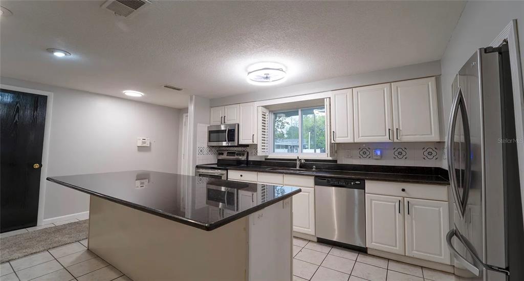 7713 Heather Street New Port Richey, FL 34653 - Photo 6 of 26