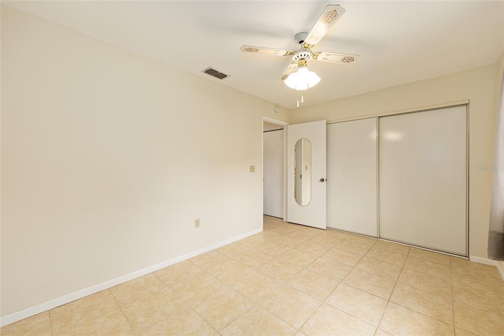 10888 Southwest 90th Court Ocala, FL 34481 - Photo 22 of 37 a view of an empty room