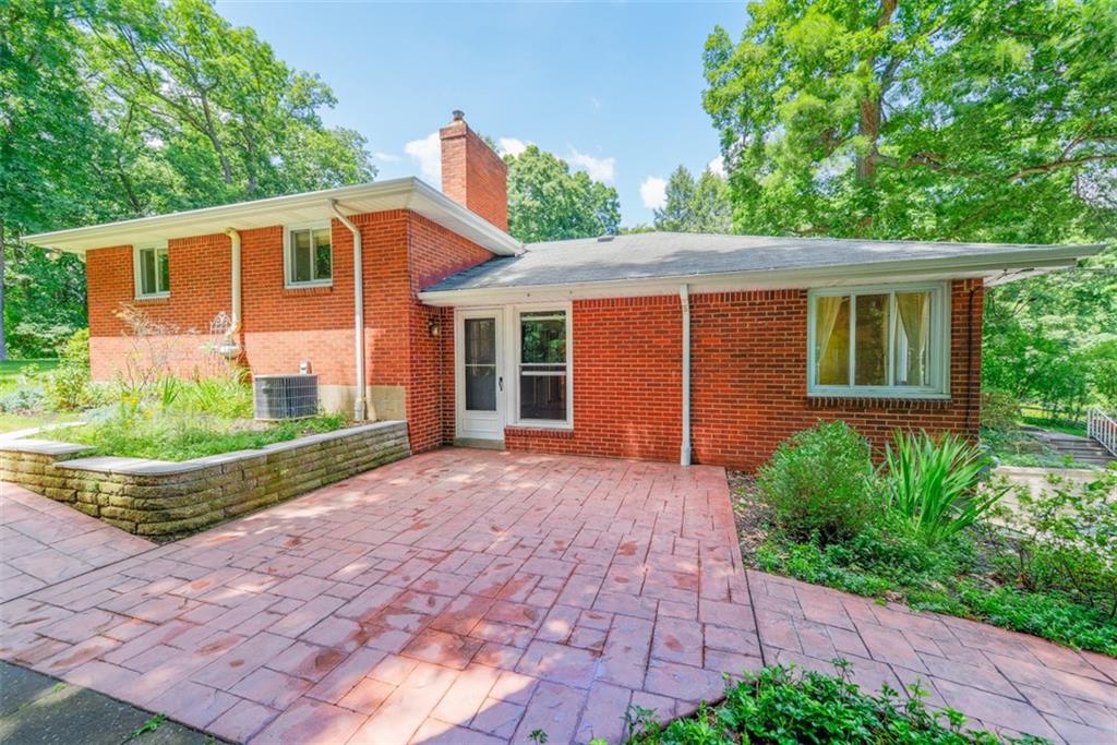 115 Byron Road Pittsburgh, PA 15237 - Photo 4 of 23 With easy access from the living room, the side patio is large and offers plenty of space for a full dining table and seating area.