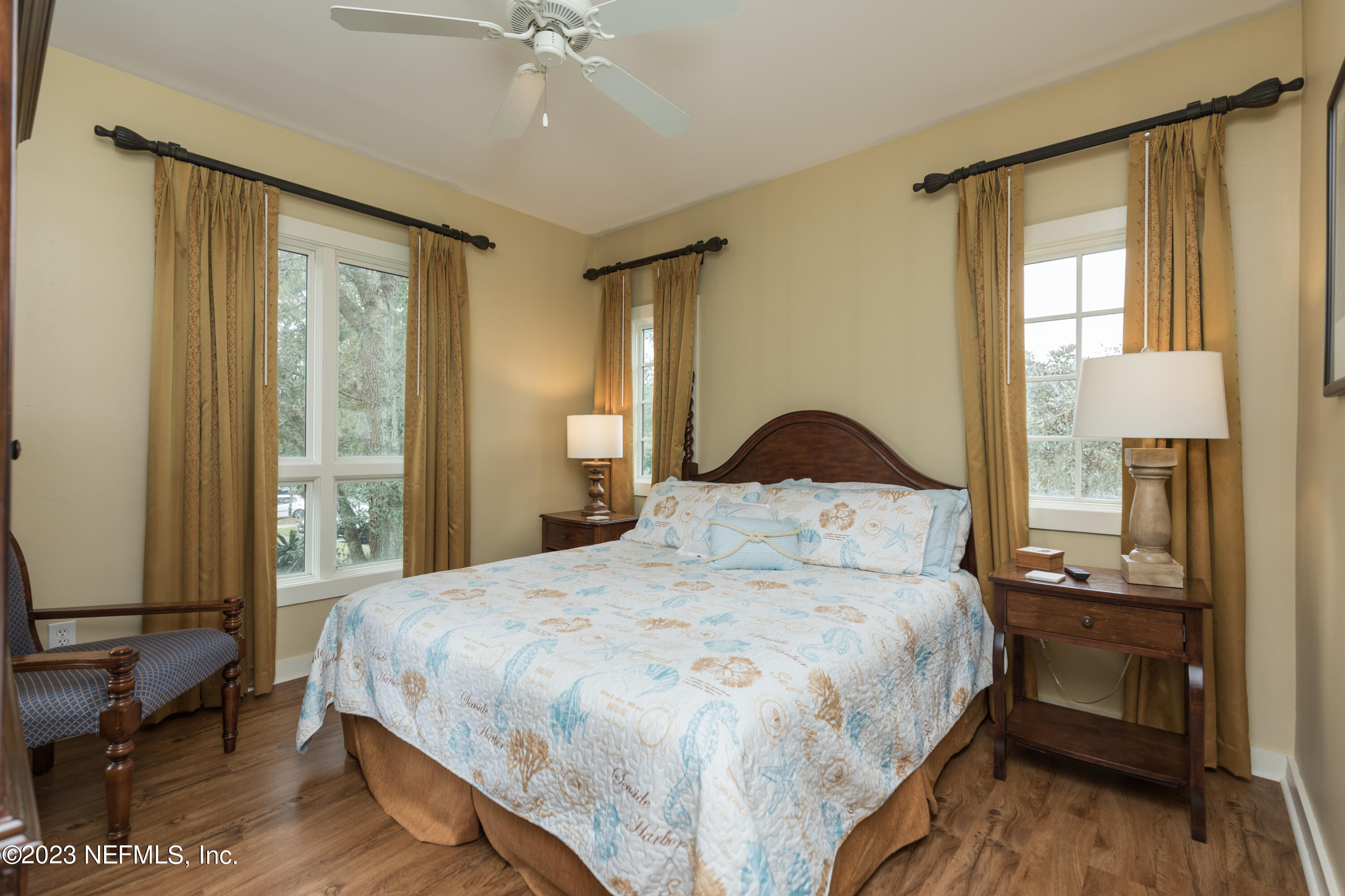 945 Registry Boulevard, Unit 201 St. Augustine, FL 32092 - Photo 33 of 65 a bedroom with a bed and a window