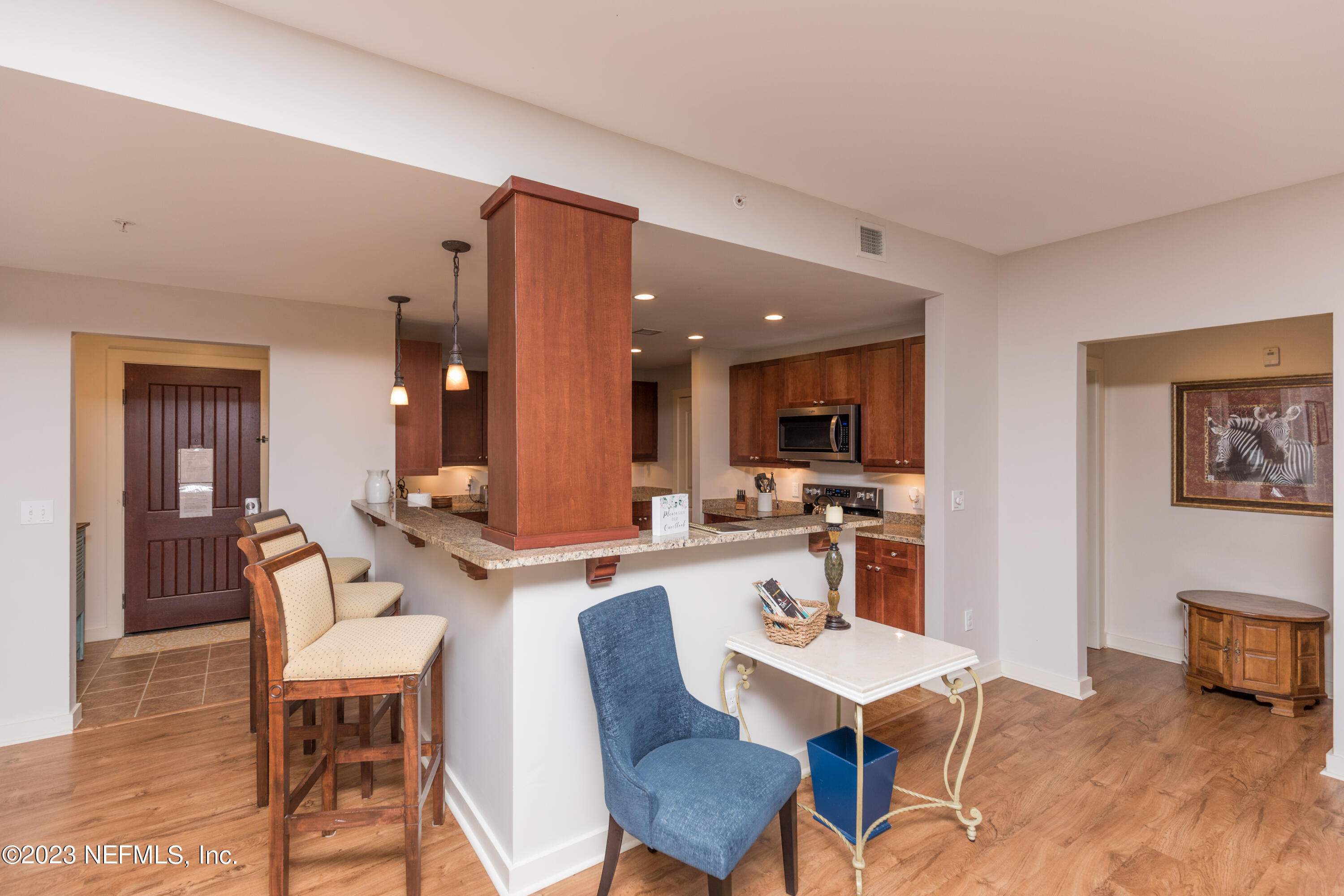 945 Registry Boulevard, Unit 201 St. Augustine, FL 32092 - Photo 45 of 65 a view of a dining room with furniture