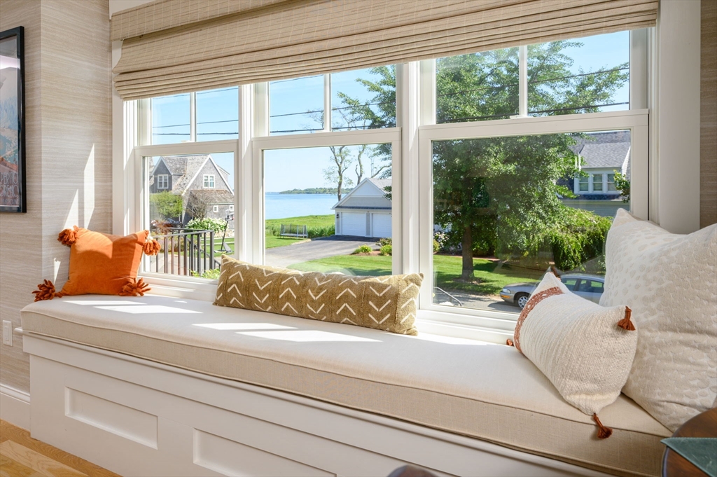 34 Highview Drive Hingham, MA 02043 - Photo 16 of 40 a living room with couch and a large window