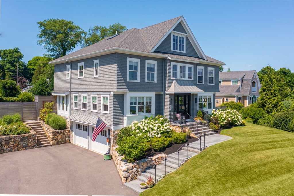 34 Highview Drive Hingham, MA 02043 - Photo 2 of 40 a front view of a house with a yard