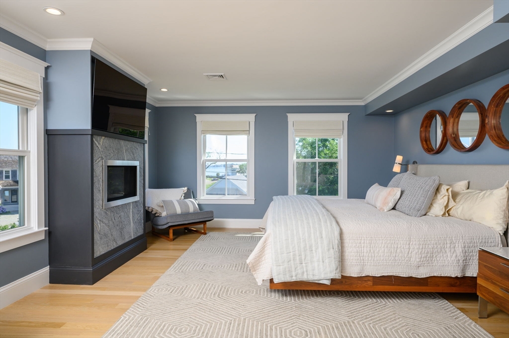 34 Highview Drive Hingham, MA 02043 - Photo 21 of 40 a bedroom with a bed and a couch