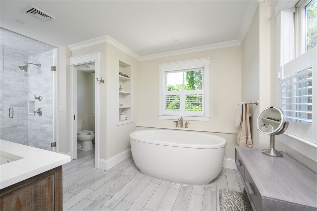 34 Highview Drive Hingham, MA 02043 - Photo 23 of 40 a spacious bathroom with a bathtub and sink