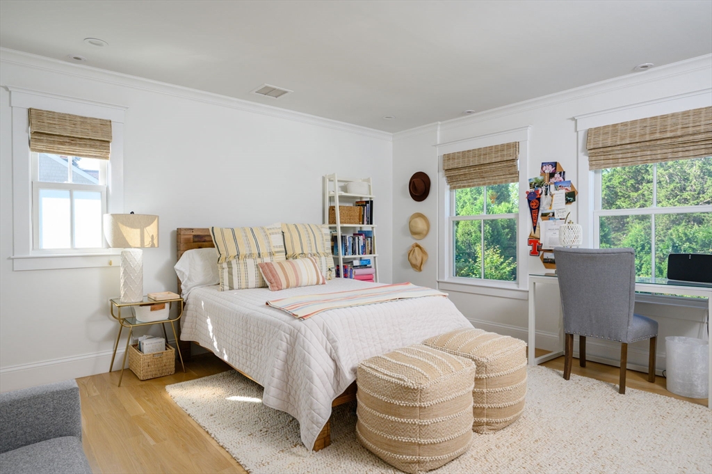 34 Highview Drive Hingham, MA 02043 - Photo 25 of 40 a bedroom with a bed and a large window