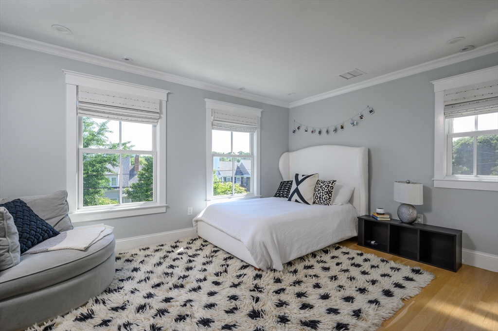 34 Highview Drive Hingham, MA 02043 - Photo 27 of 40 a bedroom with a large bed and a window