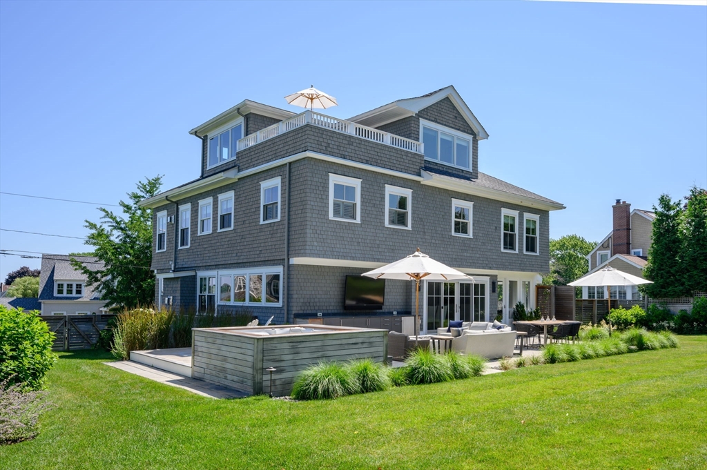 34 Highview Drive Hingham, MA 02043 - Photo 37 of 40 a front view of a house with a garden