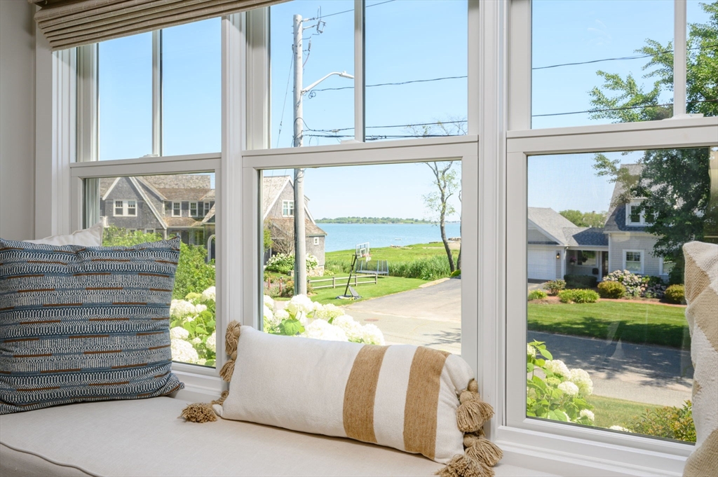 34 Highview Drive Hingham, MA 02043 - Photo 9 of 40 a bed sitting in front of a window