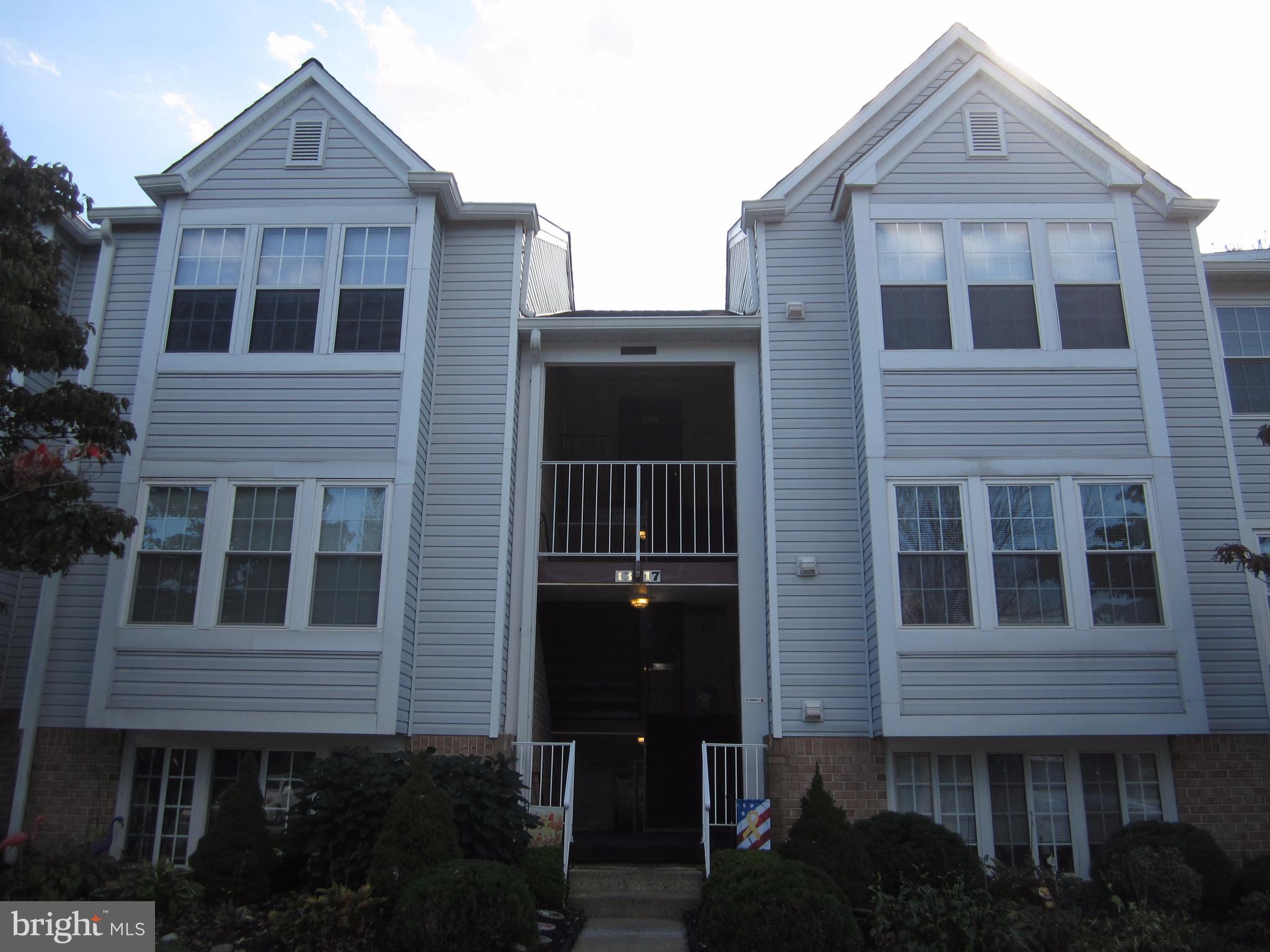 17 Bridle Lane, Unit 72 Baltimore, MD 21236 - Photo 1 of 22 a front view of a house with a yard