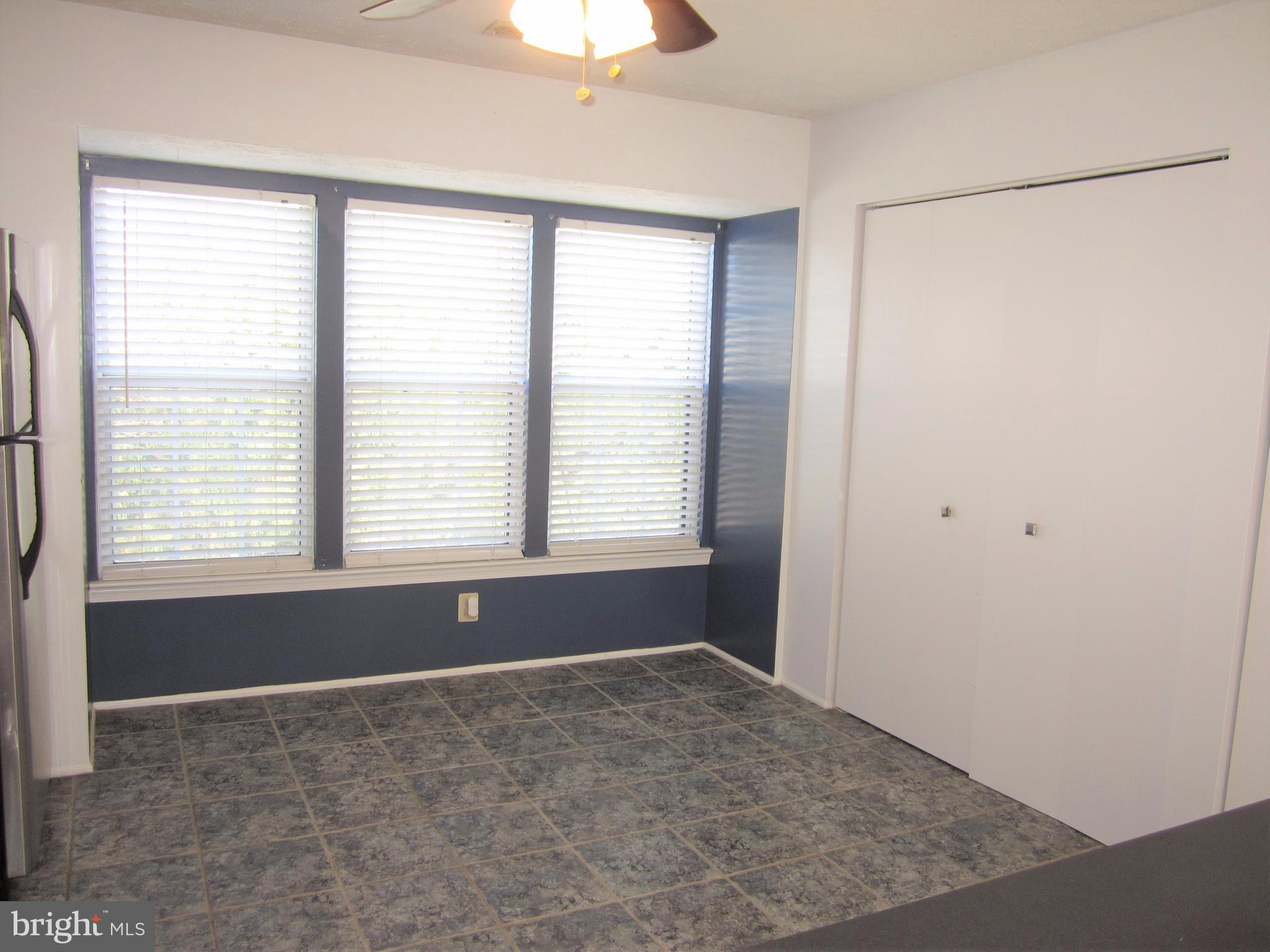 17 Bridle Lane, Unit 72 Baltimore, MD 21236 - Photo 11 of 22 a big room with a window