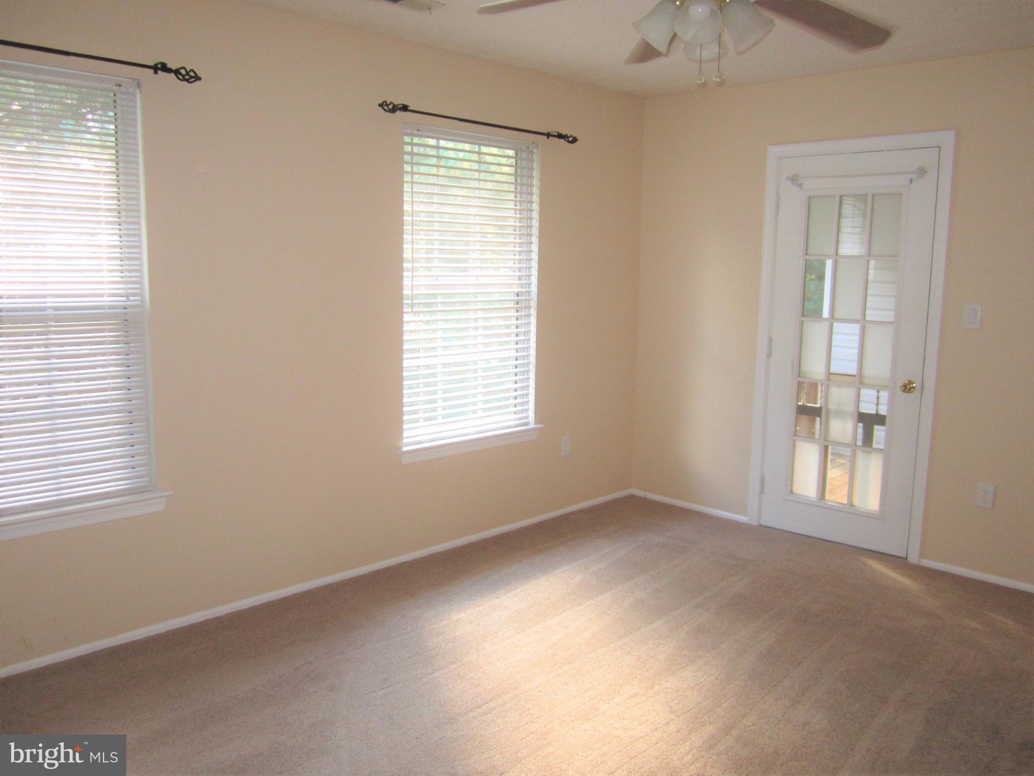 17 Bridle Lane, Unit 72 Baltimore, MD 21236 - Photo 13 of 22 a view of an empty room with a window