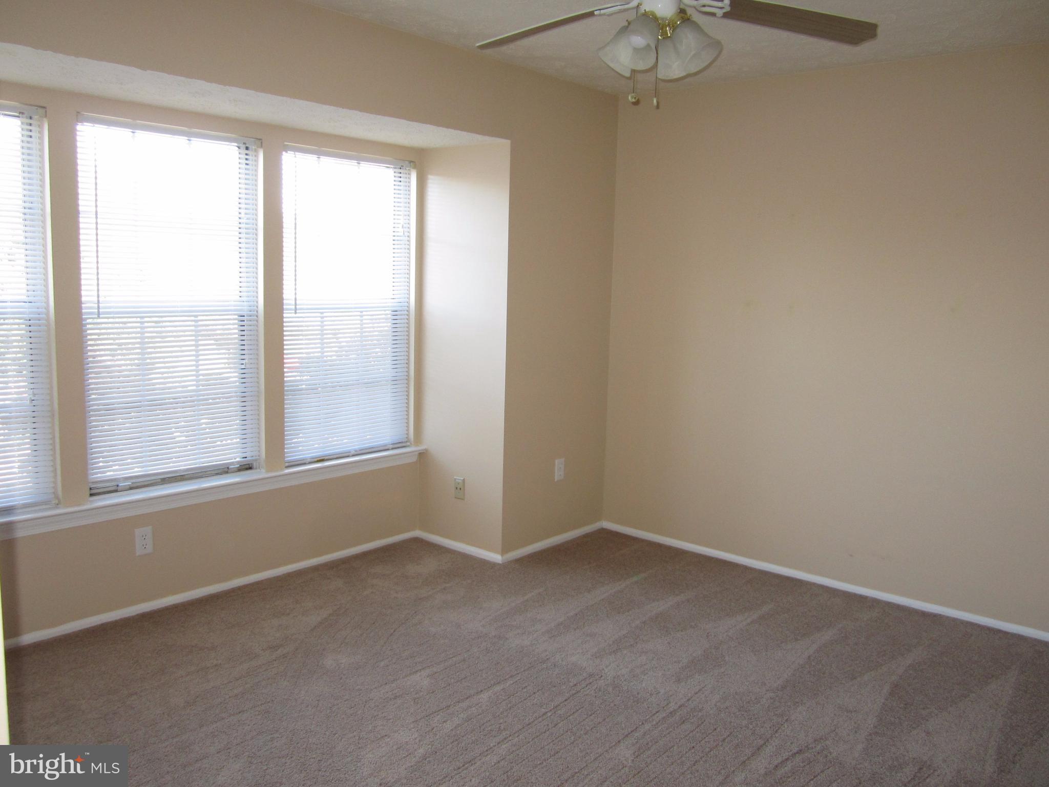 17 Bridle Lane, Unit 72 Baltimore, MD 21236 - Photo 17 of 22 an empty room with a window